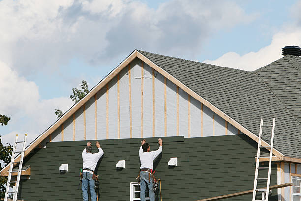 Professional Siding Installation technician working in Doylestown, PA